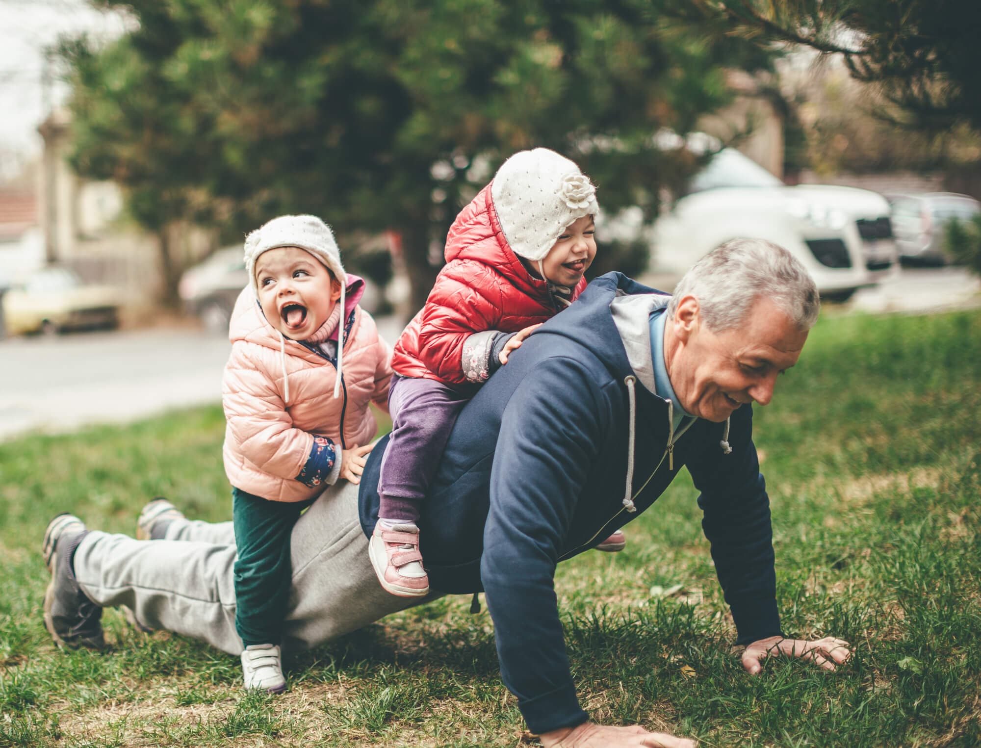 Grandfather_playing_with_grandchildren_0