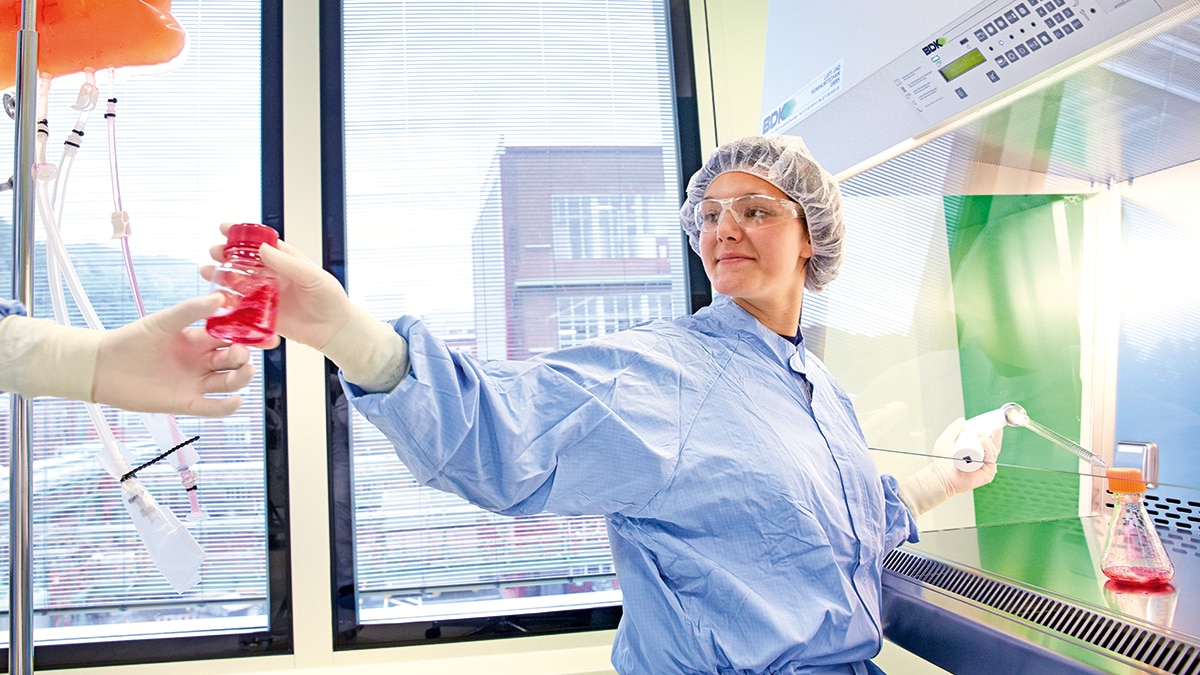 Lab employee at a sterile bench