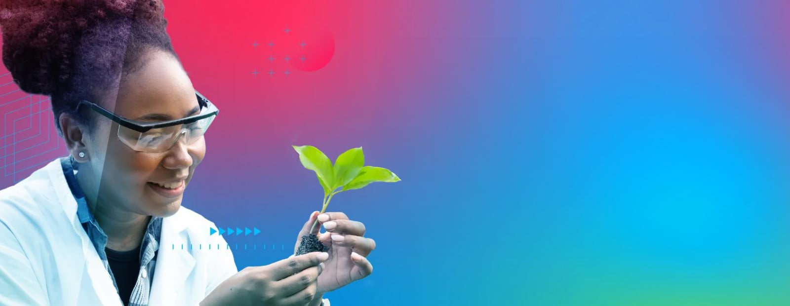 Woman inspecting a plant