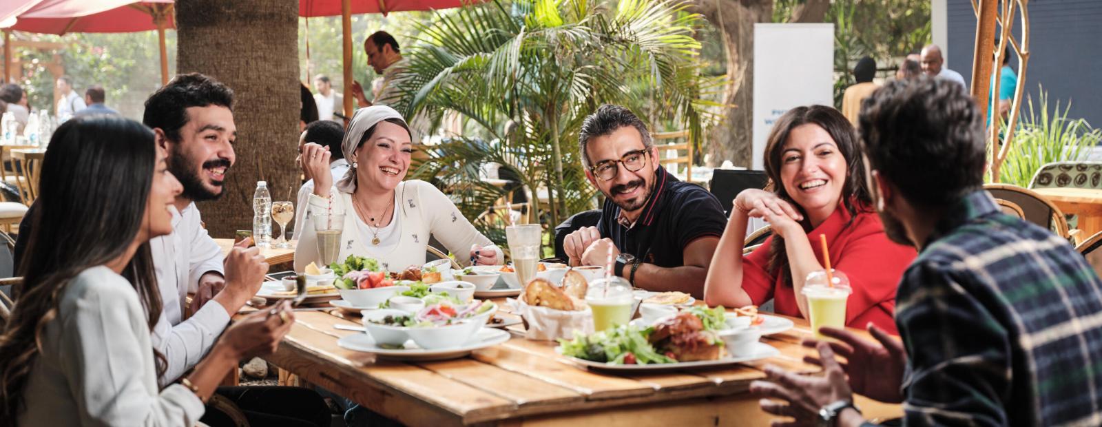 Employees sharing a healthy lunch