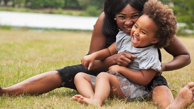 Mother playing with child