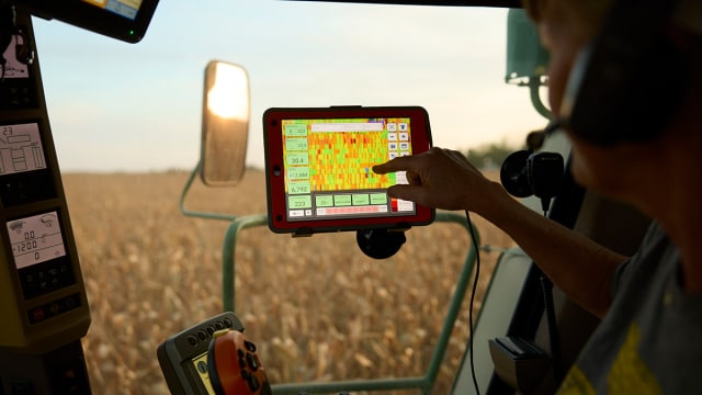 Farmer working with Climate FieldView