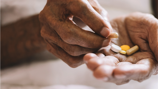 Hands holding medicaments