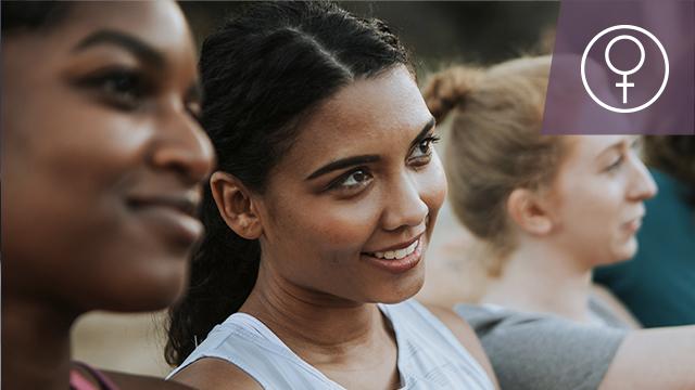 Women looking forward while smiling