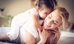 mother playing with daughter