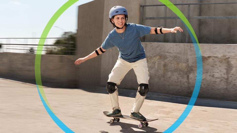 A woman on a skateboard.