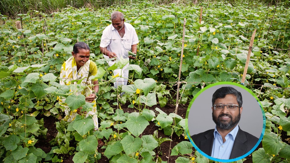 Image of Indian farmers overlaid with a portrait of VK Kishore