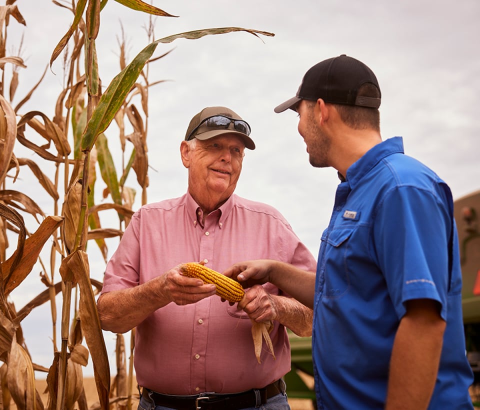 Farmer working with a Bayer Rep