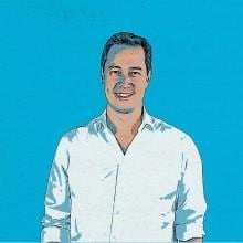 An illustration of a man standing in front of a blue background.